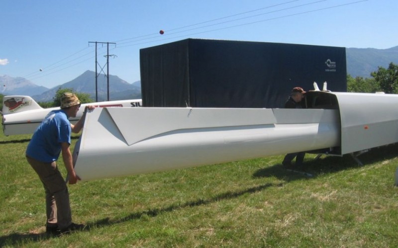 Swiftlight's wing unloading from a Cobra trailer